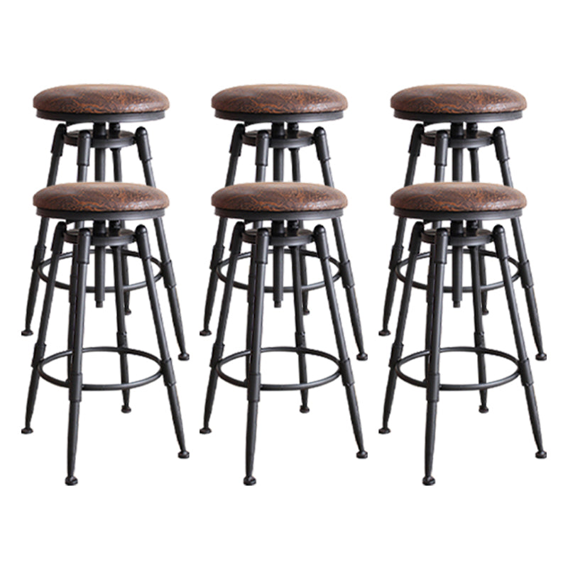 Taburete industrial de metal tapizado de piel sintética con acabado mate para interior