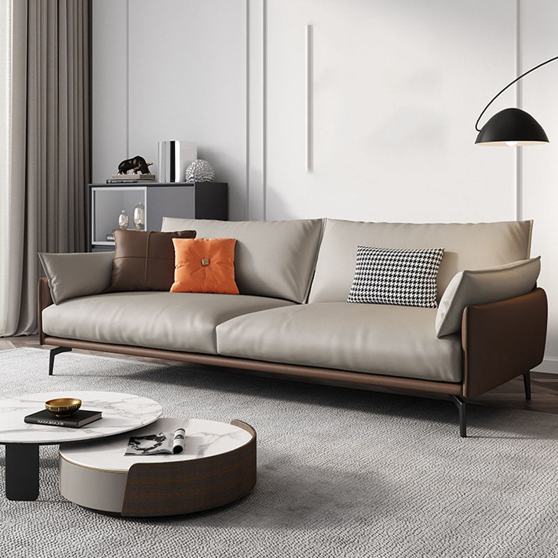 Sofá de cuero moderno de brazo de almohada en marrón con patas de metal