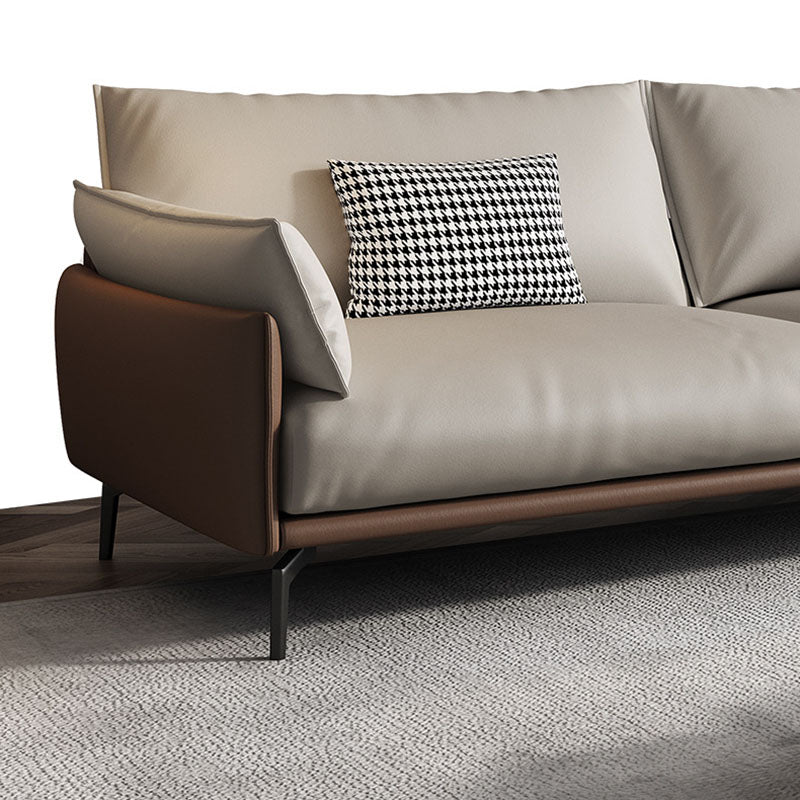 Sofá de cuero moderno de brazo de almohada en marrón con patas de metal