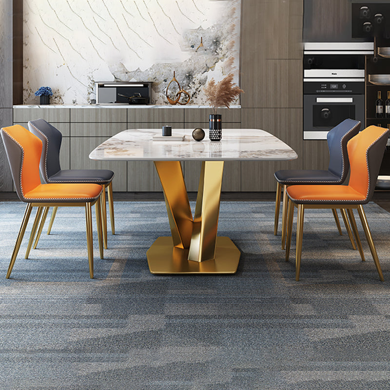 Juego de comedor glamoroso 1/2/5/7 PCS Mesa de piedra sinterizada dorada con sillas laterales de ala