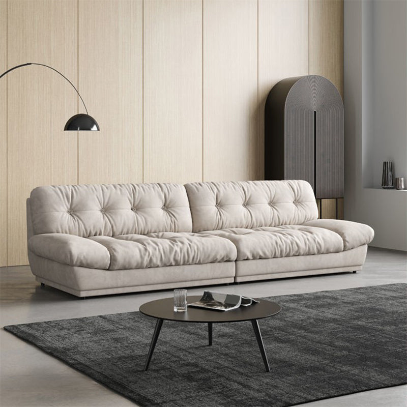 Canapé contemporain sans bras en velours blanc avec dos touflé pour le salon