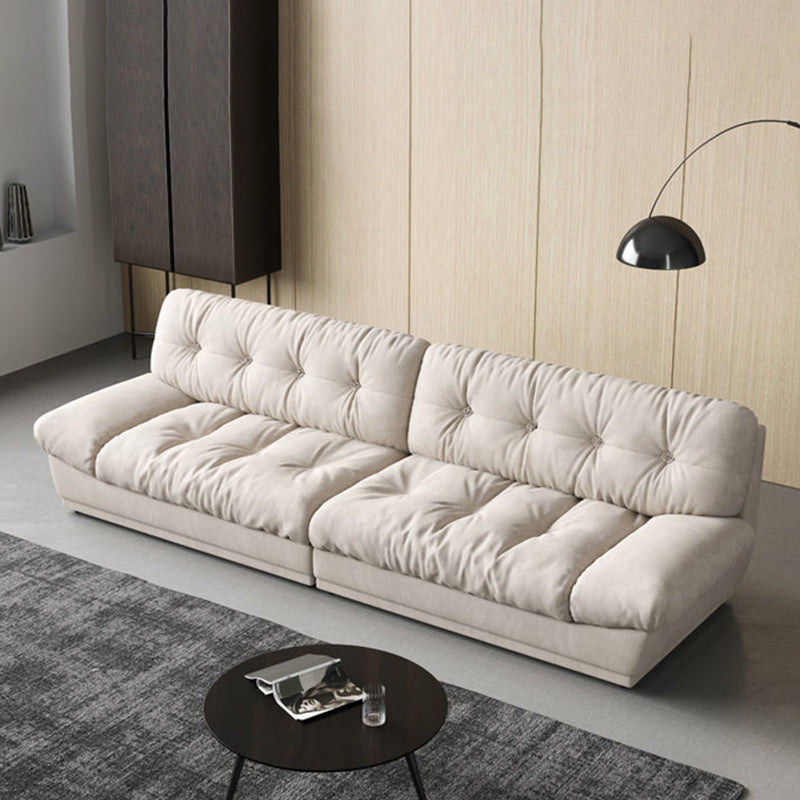 Canapé contemporain sans bras en velours blanc avec dos touflé pour le salon