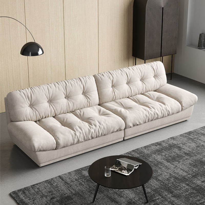 Canapé contemporain sans bras en velours blanc avec dos touflé pour le salon