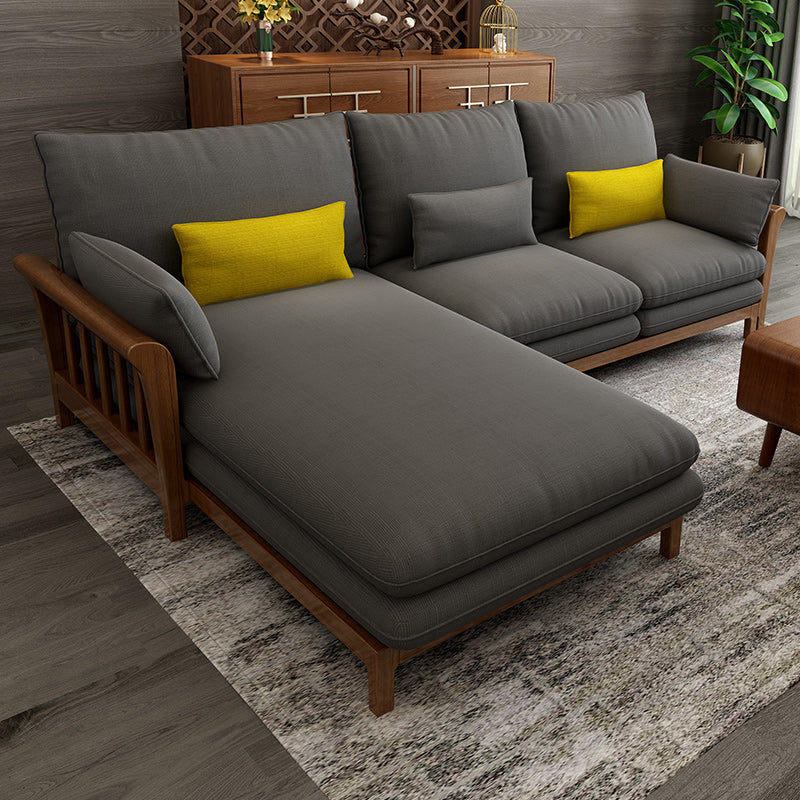 Divano sezionale braccio svasato, cuscini rimovibili con gambe di legno