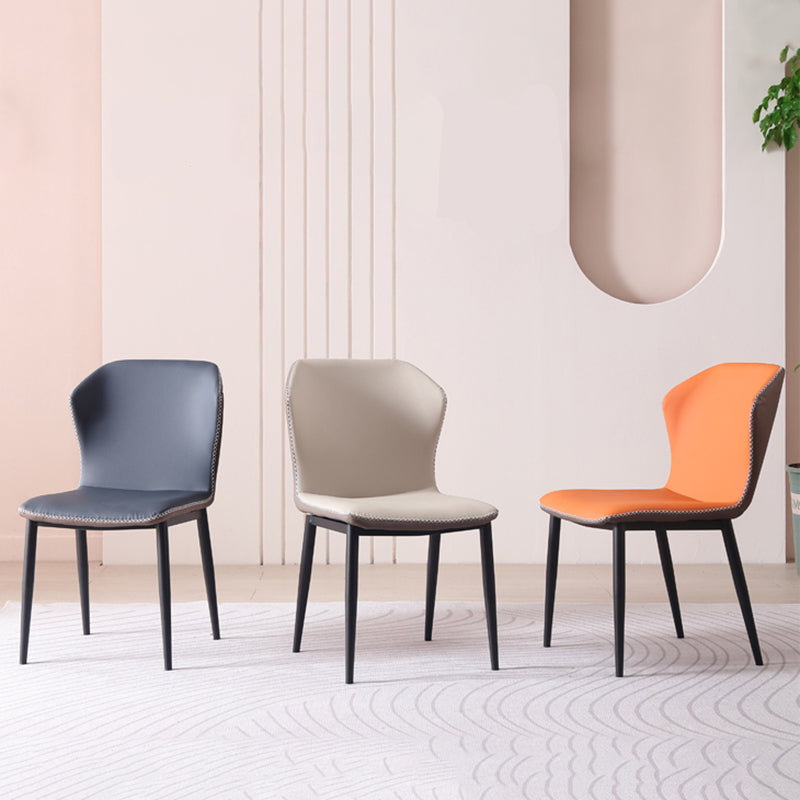 現代のアームレスダイニングチェアフェイクレザーウィングバックサイドチェア