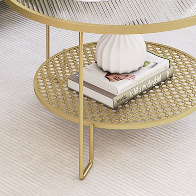 Tavolino moderno in vetro rotondo con 3 zampe di ferro e scaffale