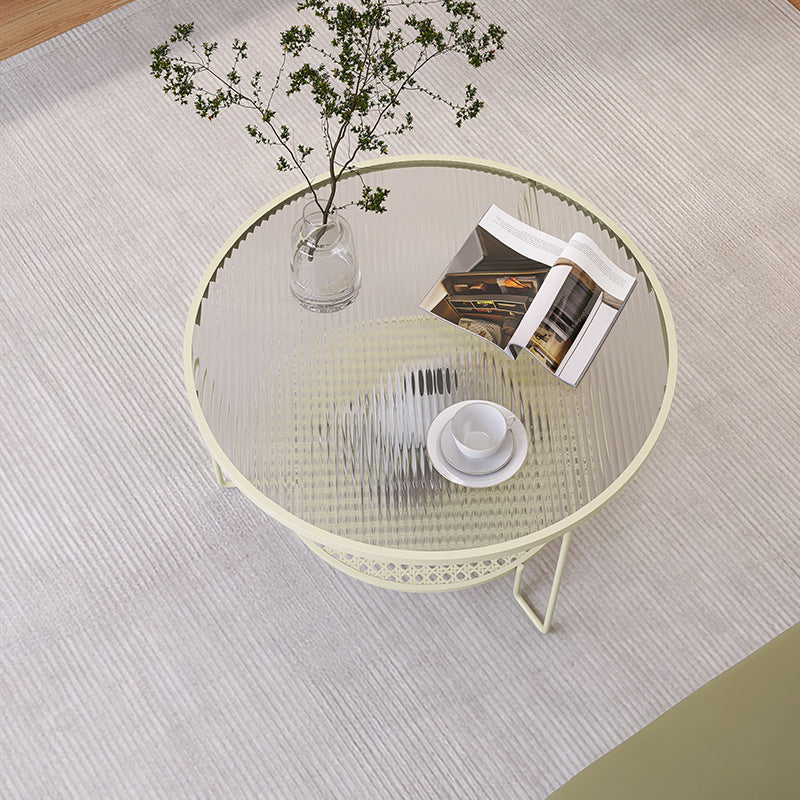 Tavolino moderno in vetro rotondo con 3 zampe di ferro e scaffale