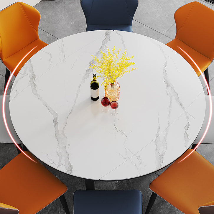 Tavolo moderno di pietra rotonda tavolo da pranzo a base nera con estensione fogliare