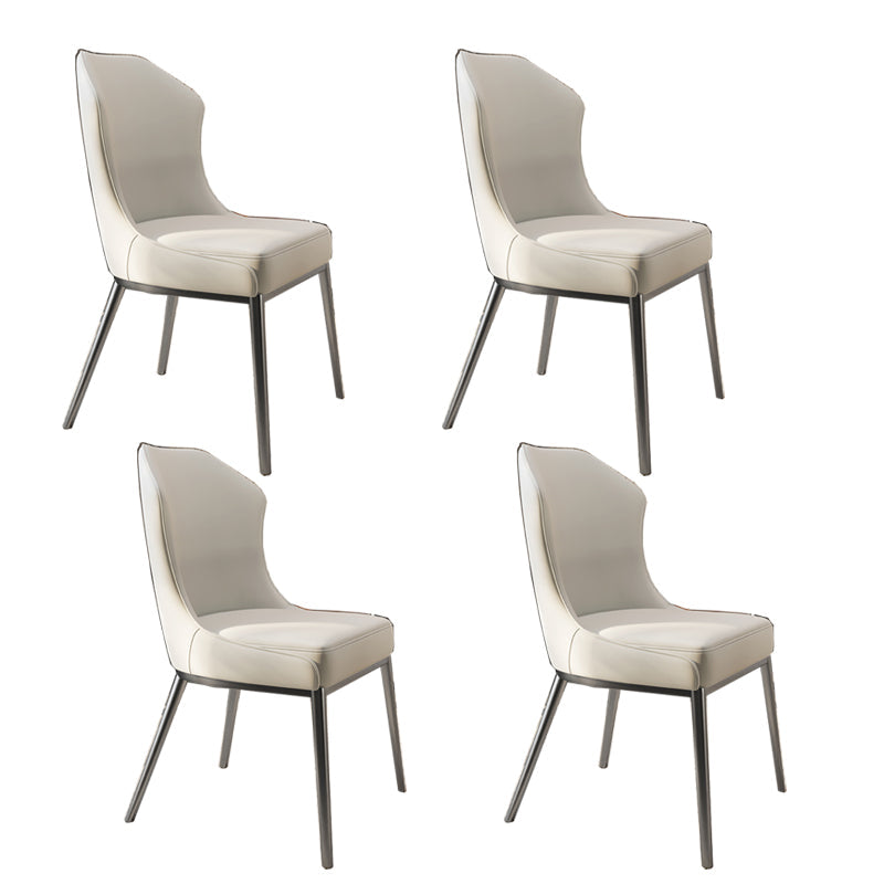 Contemporary Wingback Side Chair Faux Leather Armless Dining Chairs Off-White 4 Piece Set Clearhalo 'Dining Chairs' 'Dining Tables & Seating' 'dining_chair' 'furn' 'furn_dining_chair' 'Furniture' 'Kitchen & Dining Furniture' 5897659