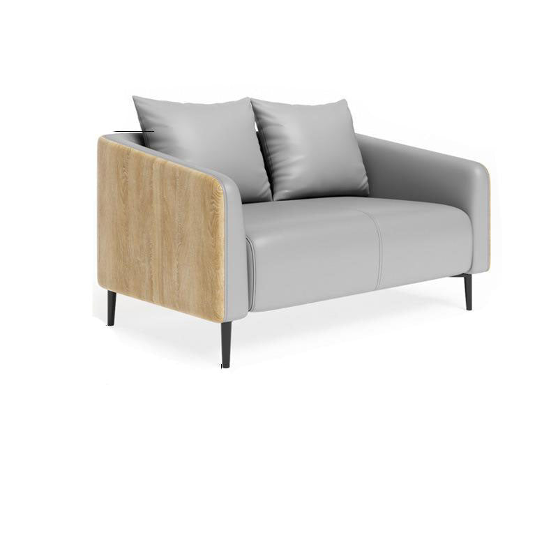モダニズムフェイクレザーソファタキシードアームソファと木目アクセント
