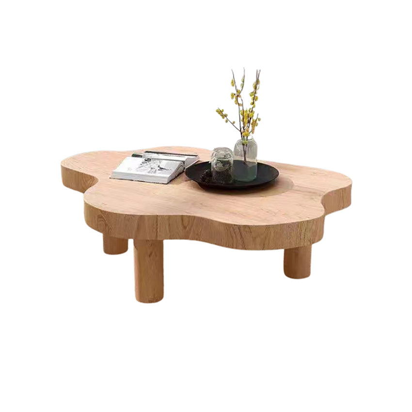 Table basse scandinave de forme libre avec 3 pieds en bois de pin