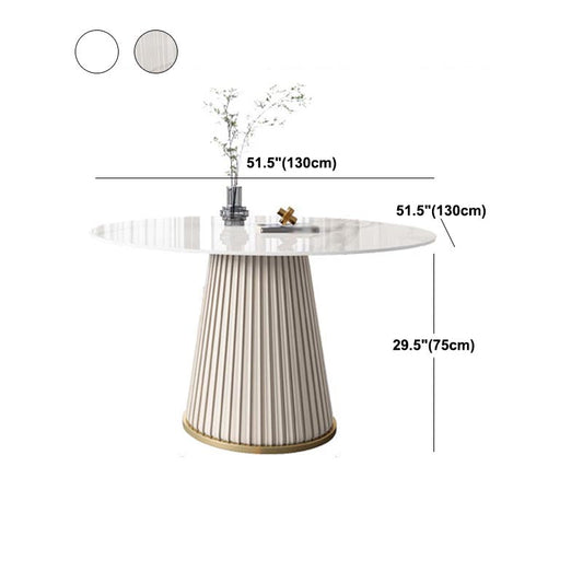 台座ベースのあるモダンラウンドストーンテーブル標準高さのダイニングルームテーブル