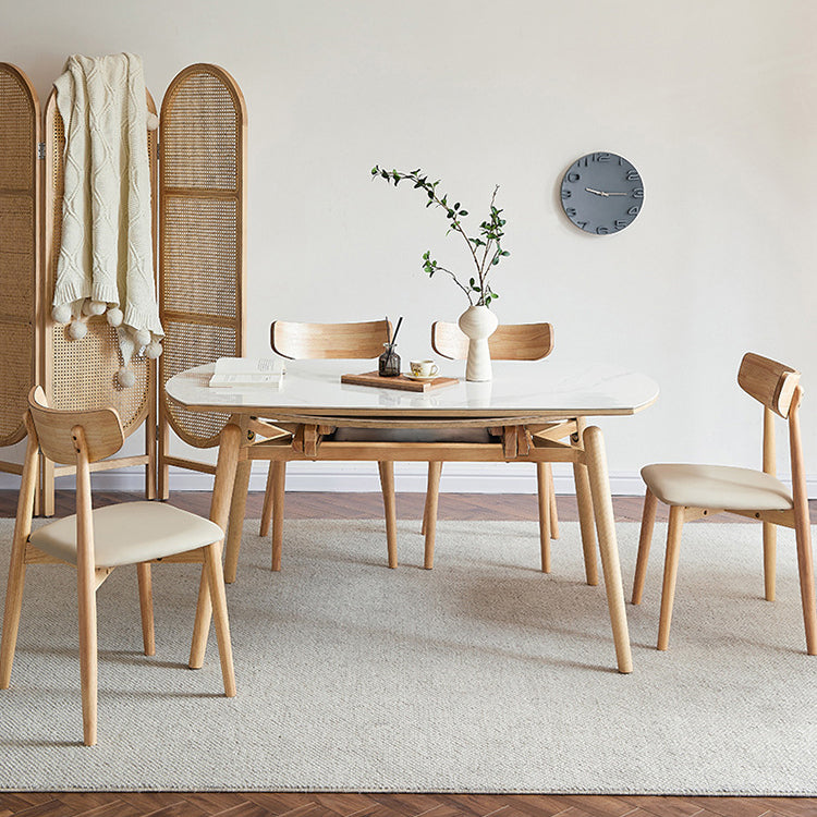 丸い焼結ストーンダイニングテーブルは、家のために4本の脚を備えたモダンな拡張可能な家具