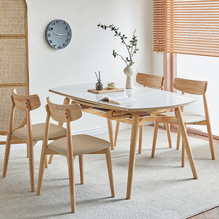 丸い焼結ストーンダイニングテーブルは、家のために4本の脚を備えたモダンな拡張可能な家具