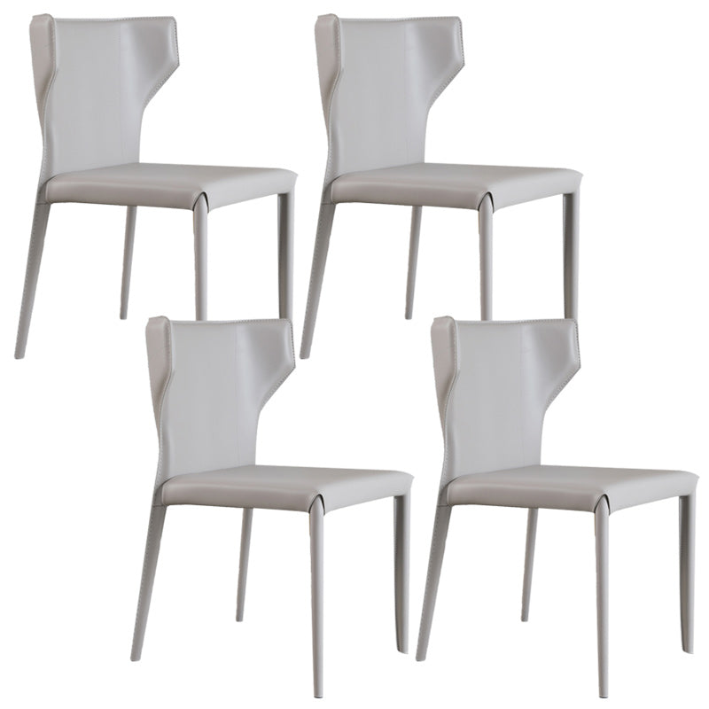 Modern Wingback Dining Chairs Faux Leather Armless Side Chair Light Khaki 4 Piece Set Clearhalo 'Dining Chairs' 'Dining Tables & Seating' 'dining_chair' 'furn' 'furn_dining_chair' 'Furniture' 'Kitchen & Dining Furniture' 5923530