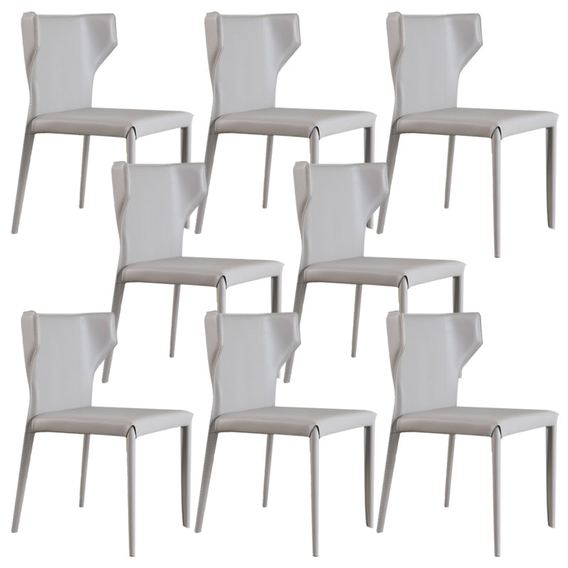 Modern Wingback Dining Chairs Faux Leather Armless Side Chair Light Khaki 8 Piece Set Clearhalo 'Dining Chairs' 'Dining Tables & Seating' 'dining_chair' 'furn' 'furn_dining_chair' 'Furniture' 'Kitchen & Dining Furniture' 5923532