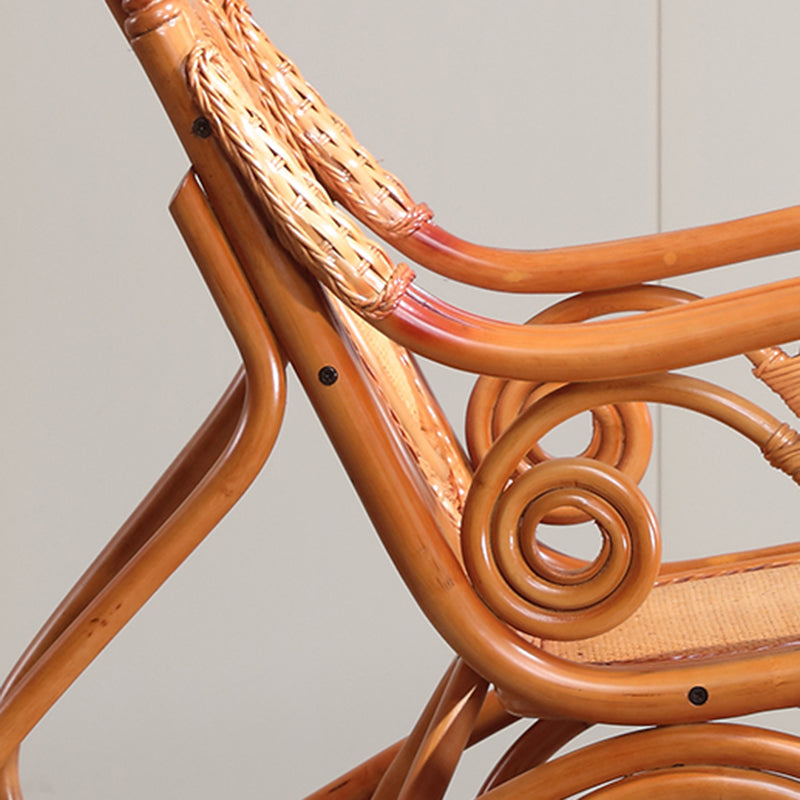 伝統的なロッキングチェアラタンフレームスピンドルバックレストソリッドカラー屋内ロッキングチェア