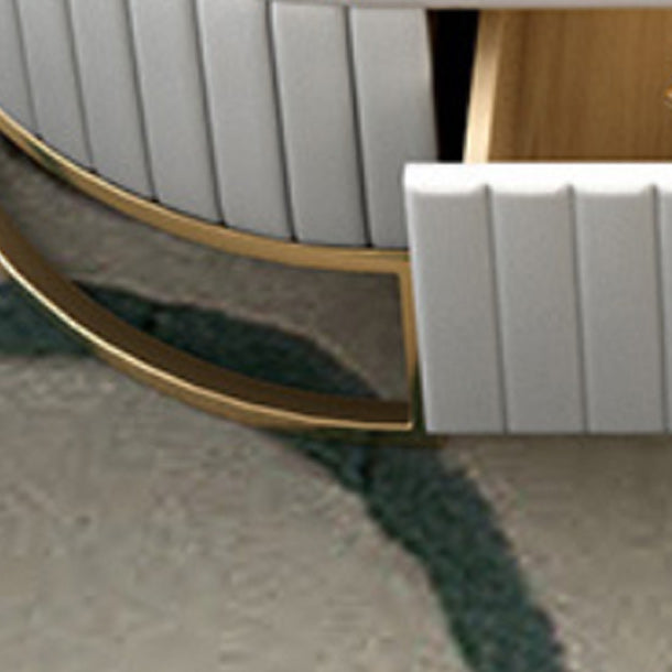 Tavolino ovale in stile glam con 1 cassetto e top in pietra e base di ferro