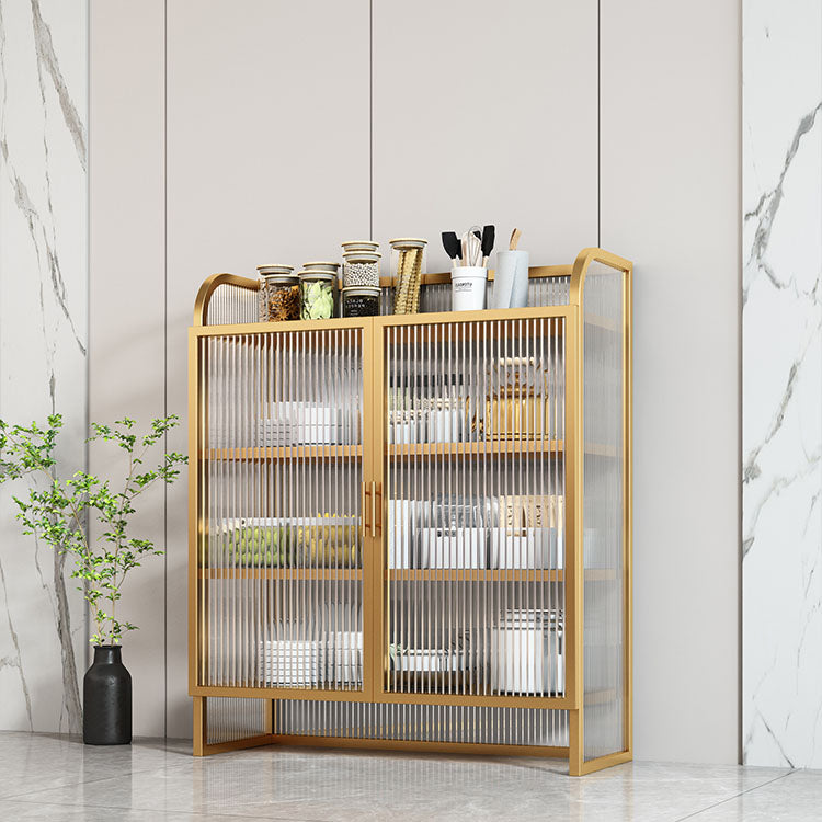 Aparador de acabado metálico con puertas de vidrio servidor de comedor glamoroso con patas de metal