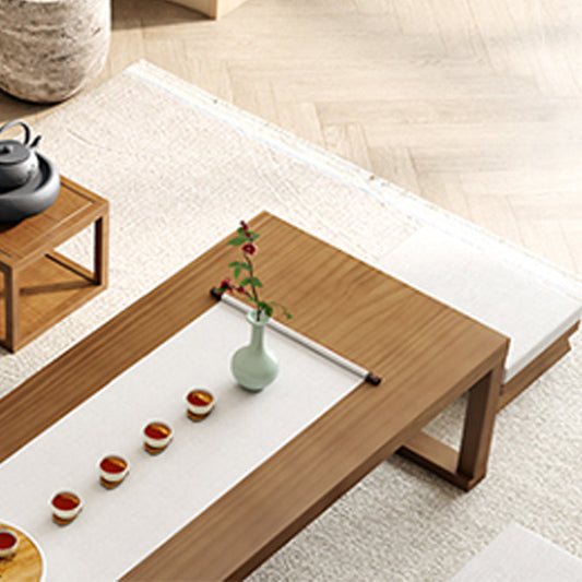 Tavolino in legno massello con gambe in slitta e top rettangolare