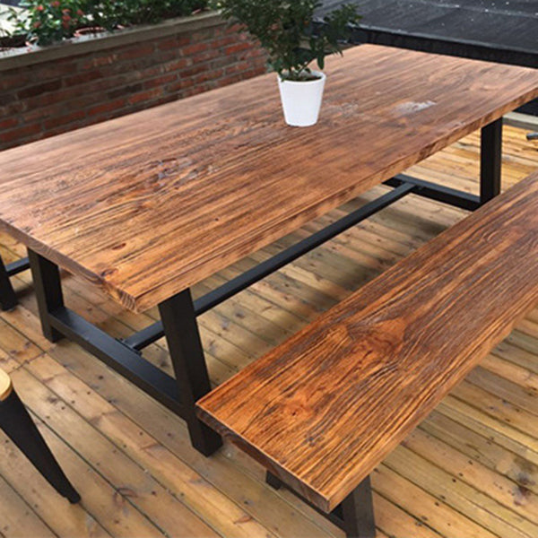 Vaste houten bovenkant eettafel industriële rechthoekige tafel met schroefbasis in zwart