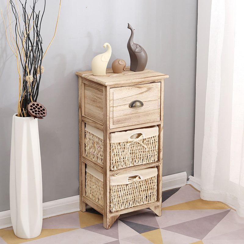 Coffre d'accent contemporain avec des tiroirs et des paniers en naturel