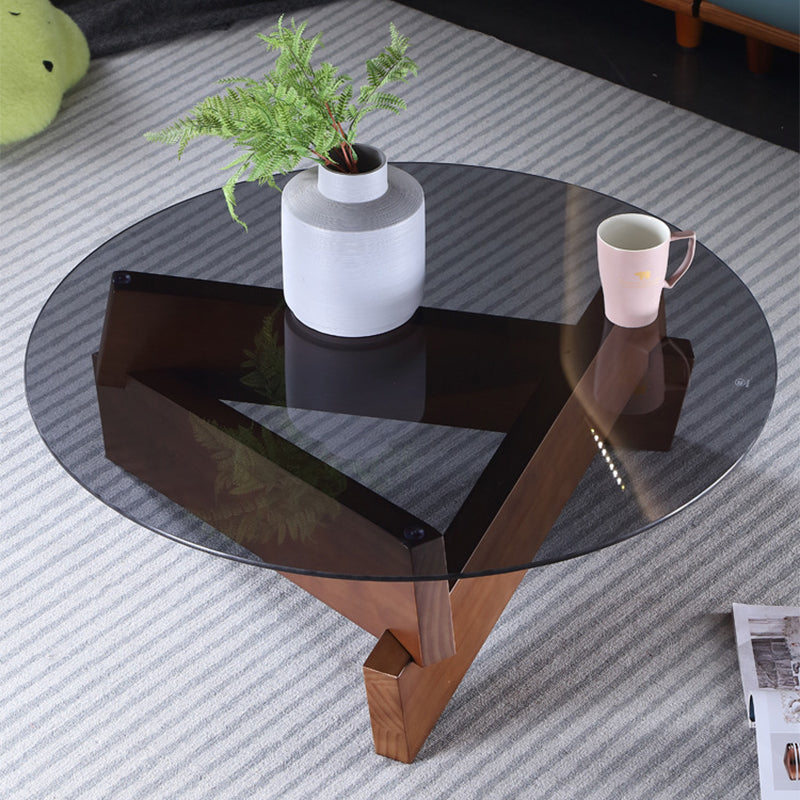 Tavolo da cocktail tondo in vetro con base in legno massiccio