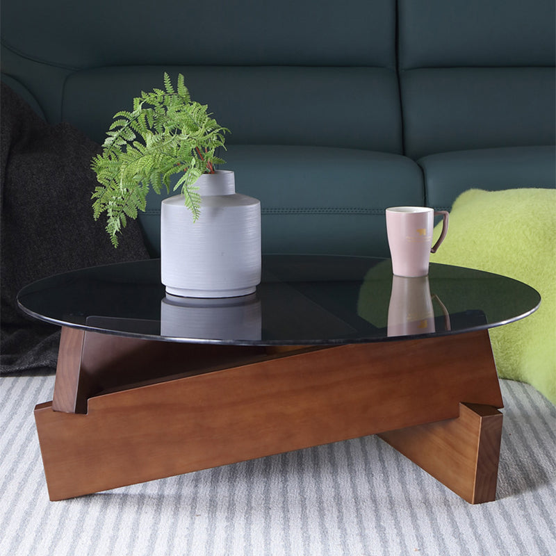 Tavolo da cocktail tondo in vetro con base in legno massiccio