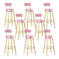 Taburete de bar de metal Glam con respaldo de tela y base dorada
