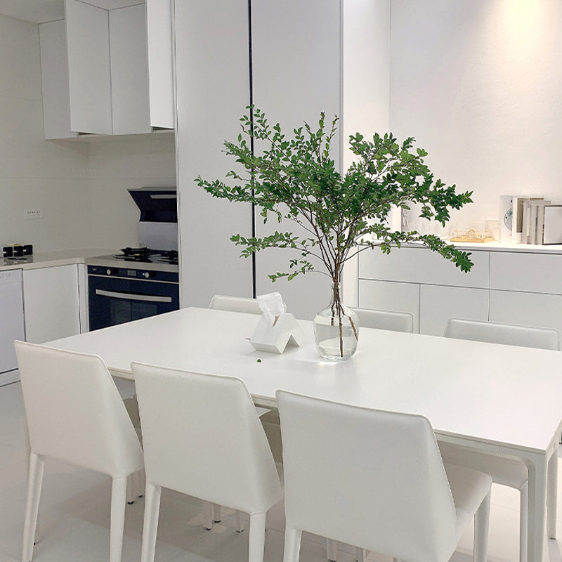 Sillas de comedor sin brazo de la espalda baja silla lateral moderna de cuero falso