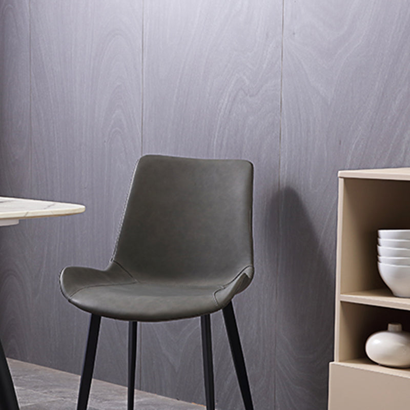 Gestoffeerde armloze eetkamerstoelen faux leer en metalen eetstoelen