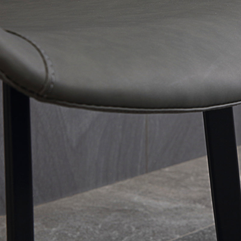 Gestoffeerde armloze eetkamerstoelen faux leer en metalen eetstoelen