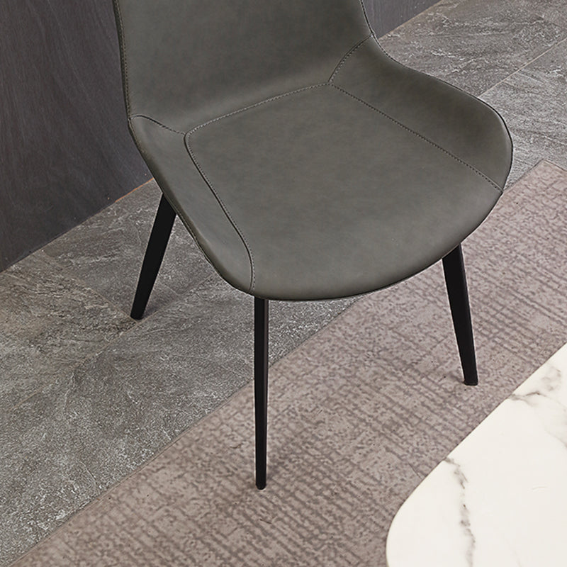 Gestoffeerde armloze eetkamerstoelen faux leer en metalen eetstoelen