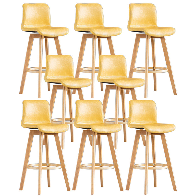 Taburete de bar de cuero con acabado mate y respaldo bajo para el hogar contemporáneo