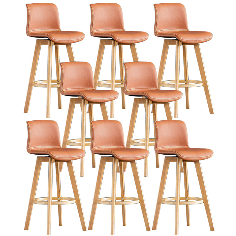 Taburete de bar de cuero con acabado mate y respaldo bajo para el hogar contemporáneo