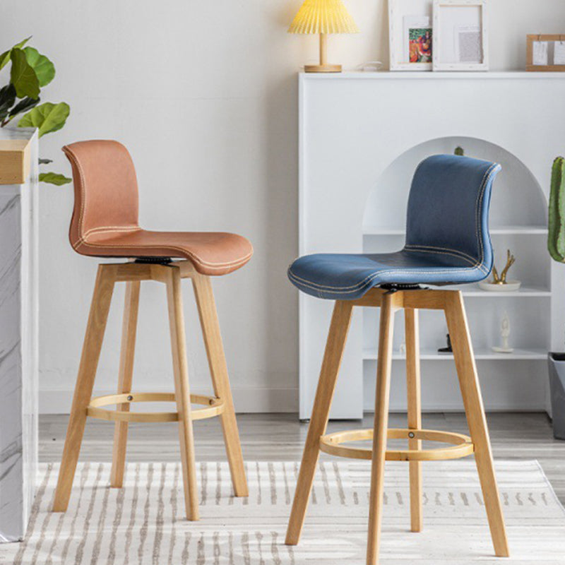 Taburete de bar de cuero con acabado mate y respaldo bajo para el hogar contemporáneo