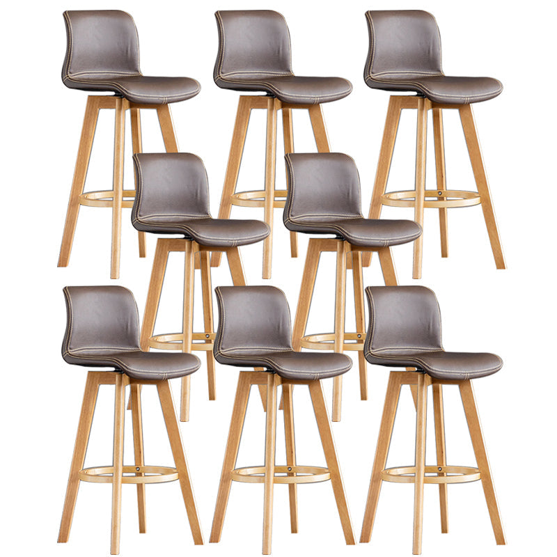 Taburete de bar de cuero con acabado mate y respaldo bajo para el hogar contemporáneo