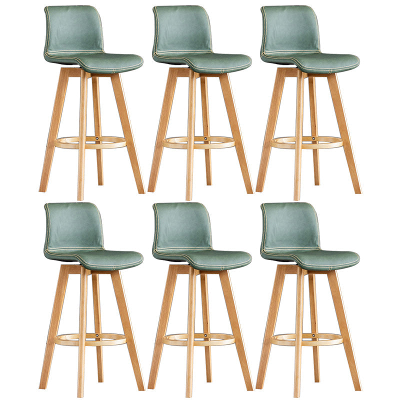 Taburete de bar de cuero con acabado mate y respaldo bajo para el hogar contemporáneo