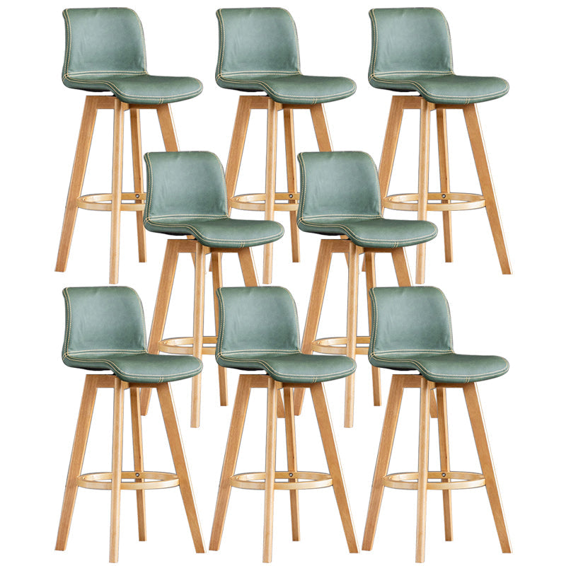 Taburete de bar de cuero con acabado mate y respaldo bajo para el hogar contemporáneo