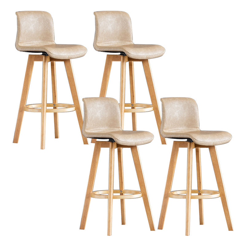 Taburete de bar de cuero con acabado mate y respaldo bajo para el hogar contemporáneo