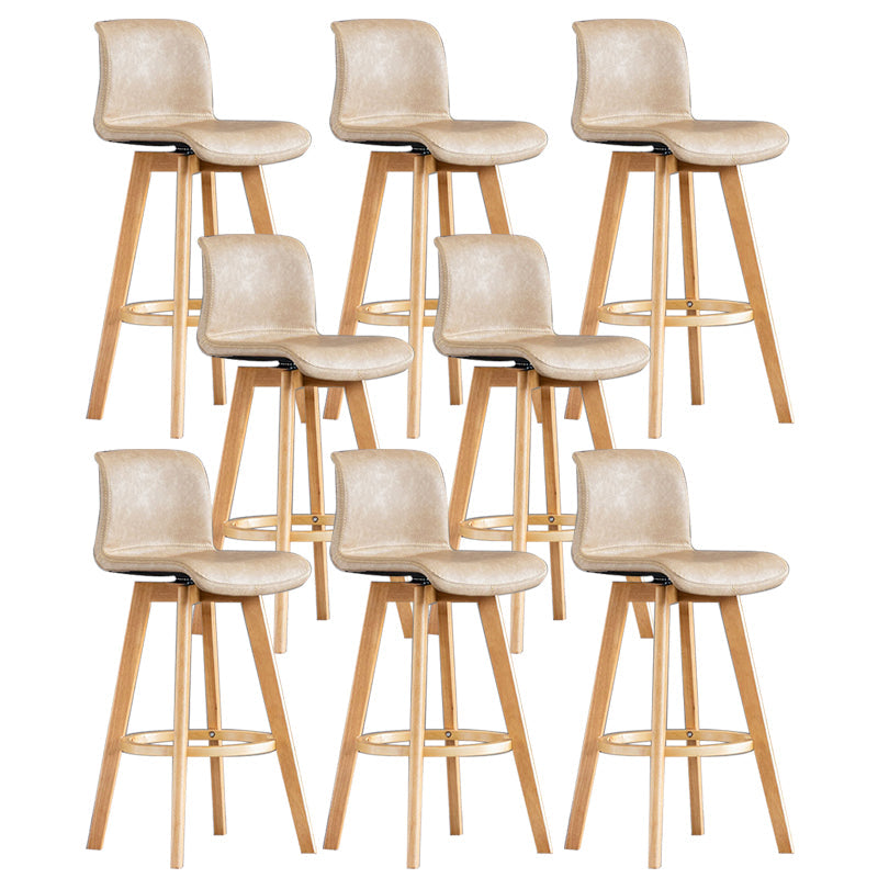 Taburete de bar de cuero con acabado mate y respaldo bajo para el hogar contemporáneo