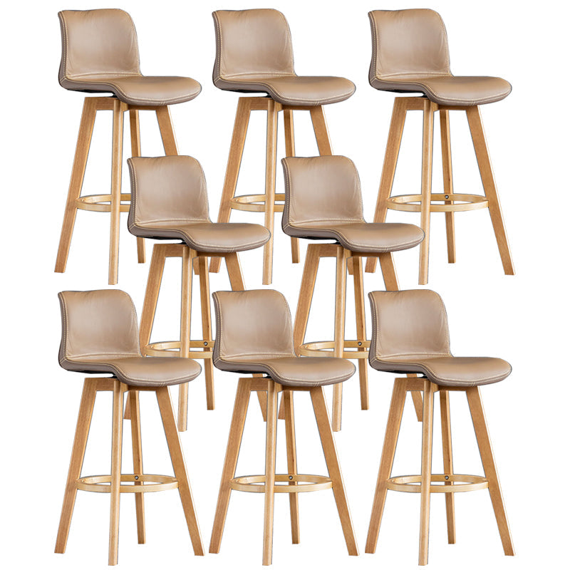 Taburete de bar de cuero con acabado mate y respaldo bajo para el hogar contemporáneo