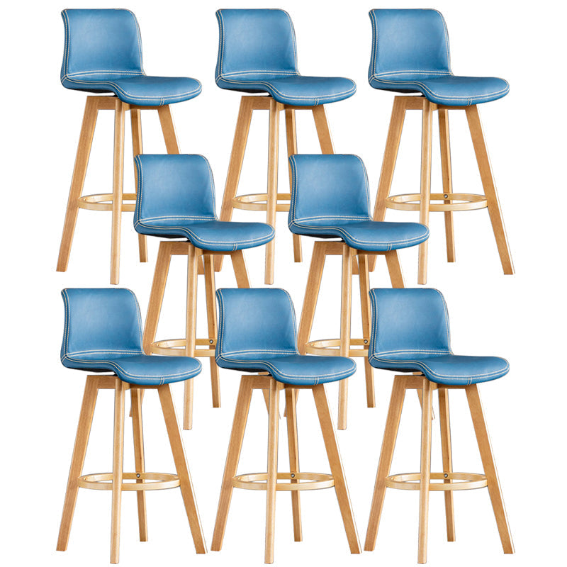 Taburete de bar de cuero con acabado mate y respaldo bajo para el hogar contemporáneo