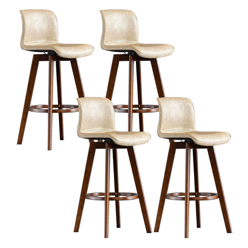 Taburete de bar de cuero con acabado mate y respaldo bajo para el hogar contemporáneo
