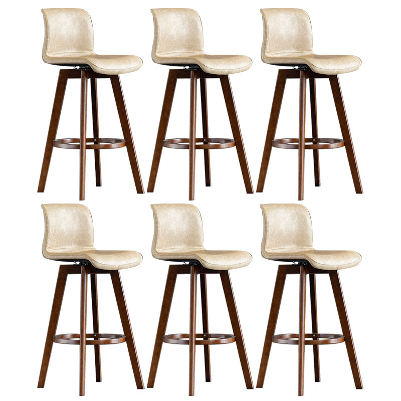 Taburete de bar de cuero con acabado mate y respaldo bajo para el hogar contemporáneo