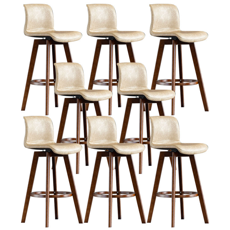 Taburete de bar de cuero con acabado mate y respaldo bajo para el hogar contemporáneo