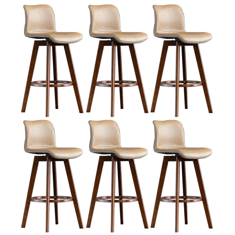 Taburete de bar de cuero con acabado mate y respaldo bajo para el hogar contemporáneo