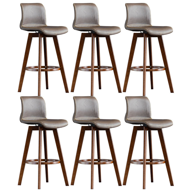 Taburete de bar de cuero con acabado mate y respaldo bajo para el hogar contemporáneo
