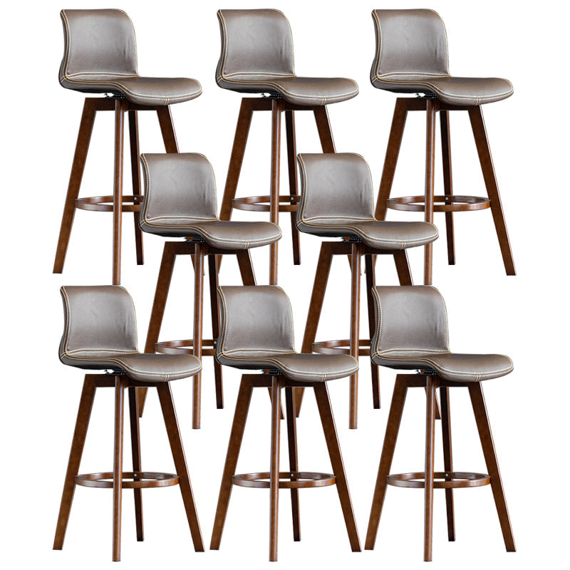 Taburete de bar de cuero con acabado mate y respaldo bajo para el hogar contemporáneo