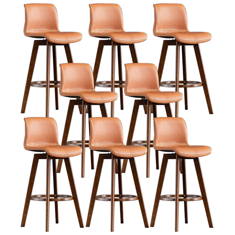 Taburete de bar de cuero con acabado mate y respaldo bajo para el hogar contemporáneo